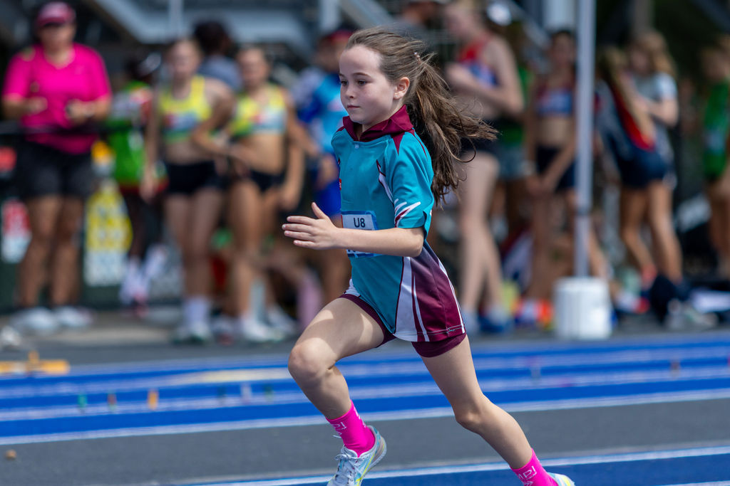 Junior girl sprinting