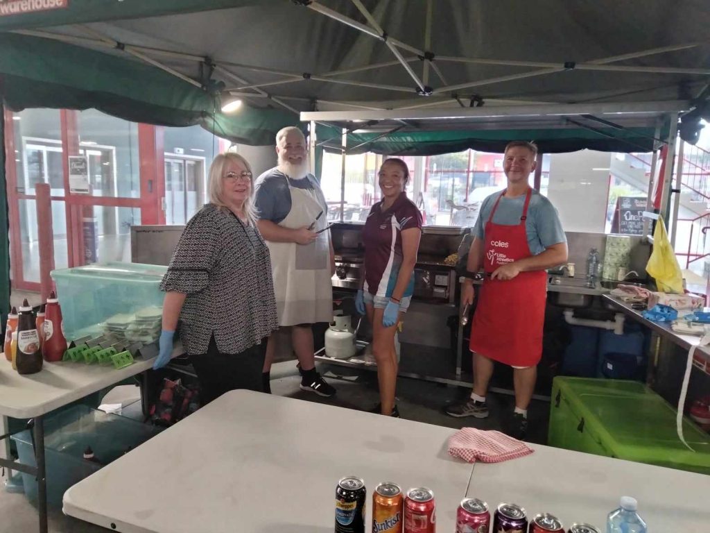 Springwood Sharks Supports assisting at Bunnings BBQ Fund Raising